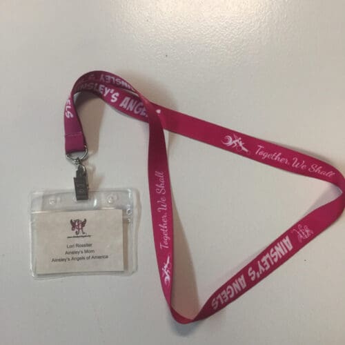 Ainsley’s Angels of America pink lanyard